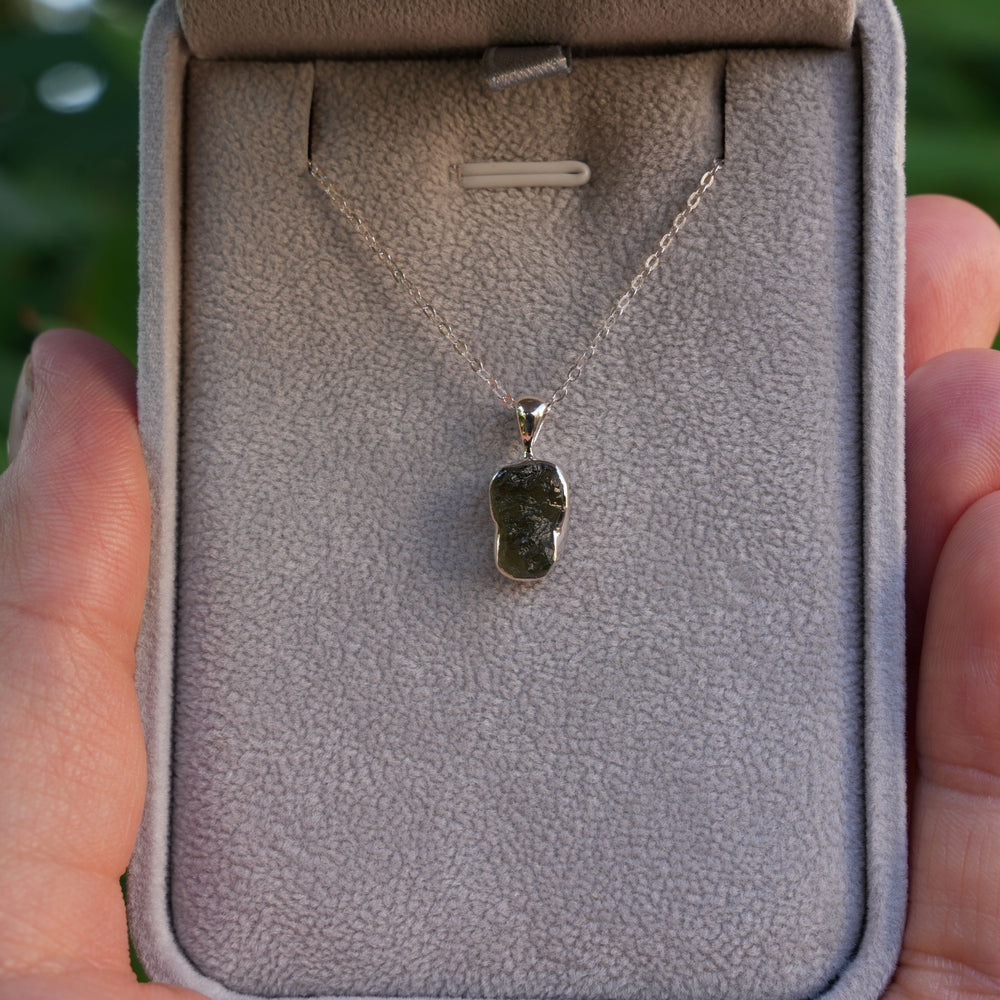
                  
                    Raw Authentic Moldavite Pendant Necklace | 925 Stirling Silver | AAA Grade | Reiki Infused
                  
                