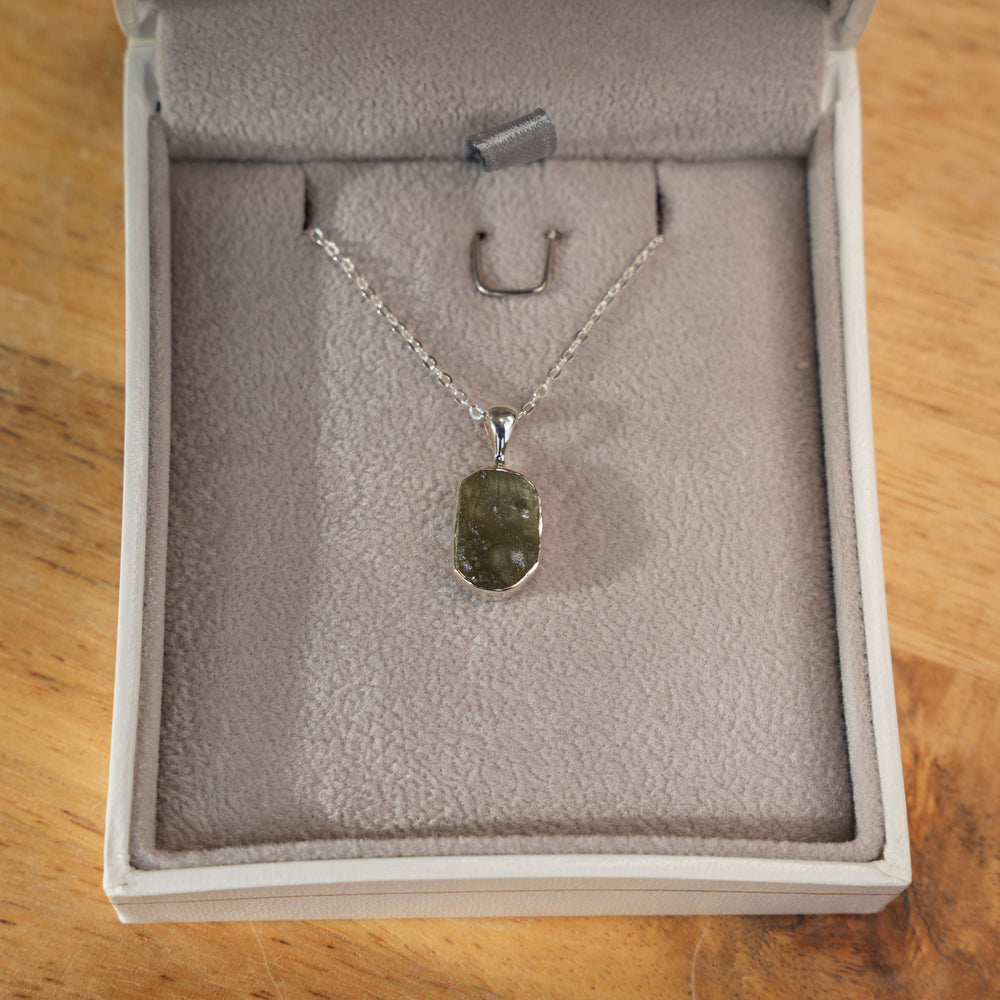 
                  
                    Raw Authentic Moldavite Pendant Necklace | 925 Stirling Silver | AAA Grade | Reiki Infused
                  
                